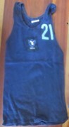 The first MUBC jerseys, made from a blue work singlet and hand stitched numbers